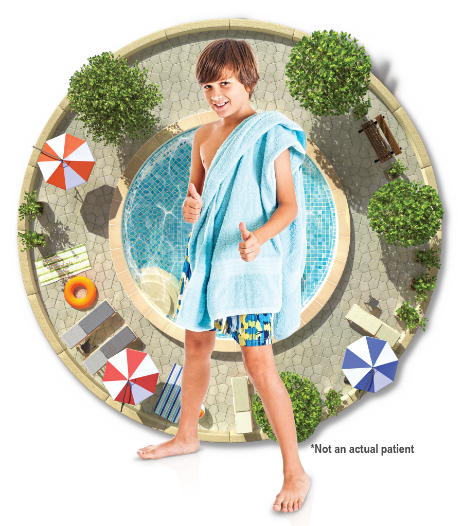 Boy standing in front of circle containing pool theme